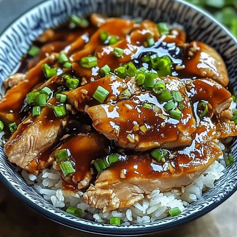 Caramelised soy chicken in garlic ginger broth served with rice