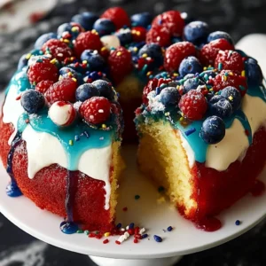 Lemon Berry Firecracker Cake topped with fresh berries and lemon zest