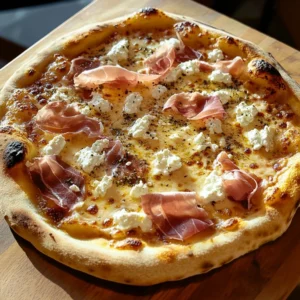 Delicious fast fig pizza topped with goat cheese and prosciutto