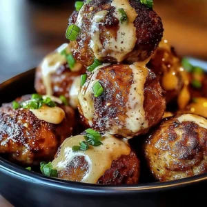 Korean BBQ meatballs served with spicy mayo dip on a plate