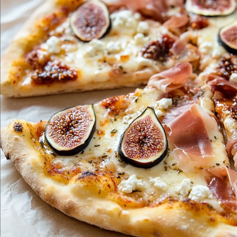 Homemade fig jam pizza topped with goat cheese and prosciutto ready to serve